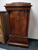 A nineteenth century mahogany pedestal cabinet