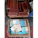 A box of penguin blue books and further set of books