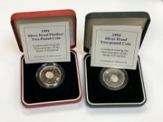 Two silver proof two-pound coins,