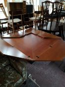 A contemporary extending square dining room table.