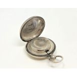 An antique silver sovereign case,