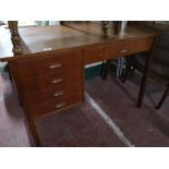 A teak mid century office desk.