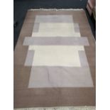 A contemporary carpet 310cm by 193cm