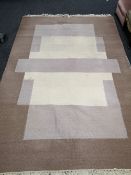 A contemporary carpet 310cm by 193cm