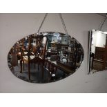 An early twentieth century oval mirror