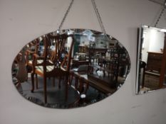 An early twentieth century oval mirror