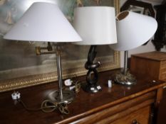 Three contemporary table lamps