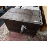 A nineteenth century oak metal bound shipping trunk