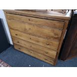 A nineteenth century elm five drawer chest