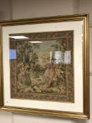 A gilt framed tapestry - lovers in a garden