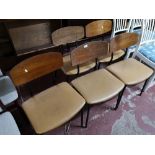 Five mid century metal and ply dining chairs.