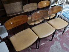 Five mid century metal and ply dining chairs.