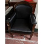 An early 20th century mahogany armchair.