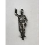 A solid silver figure of a knight, height 8.