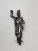 A solid silver figure of a knight, height 8.