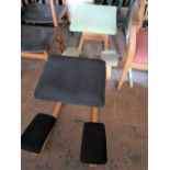 Two Scandinavian office kneeler chairs.