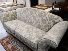 A reproduction four seater classical style settee in two-tone fabric