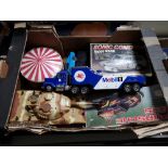 A box of model vehicles, tank,