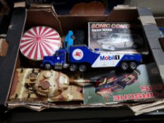 A box of model vehicles, tank,