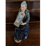 A Royal Doulton figure - The Cup of Tea HN 2322