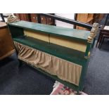 A painted gilt highlighted bookcase