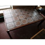 A mid century tiled topped Scandinavian low table.