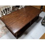 A heavy quality reproduction oak low table with undershelf