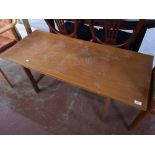 A teak mid century coffee table.