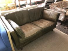 A mid century tan leather two seater settee.