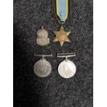 Two Second world war defence medals together with a further Air Crew star and ARP badge