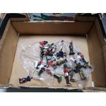 A box of military soldier figures,