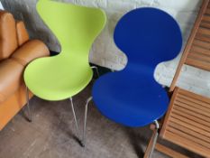 A late 20th century Fritz Hansen Arne Jacobsen designed green plastic dining chair,
