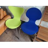 A late 20th century Fritz Hansen Arne Jacobsen designed green plastic dining chair,