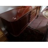 A mid 20th century mahogany sideboard fitted with five drawers.