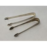 Two pairs of Georgian silver sugar tongs (2) CONDITION REPORT: 59g gross.