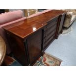 A reproduction mahogany inverted breakfronted sideboard