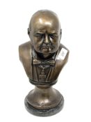 A metal bust : Winston S. Churchill, on circular marble base, overall height 34 cm.