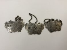 A set of three Victorian silver decanter labels, two Madeira and one Marsala,