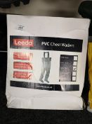 A boxed set of pvc chest waders