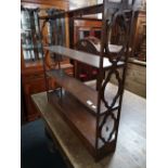 A nineteenth century mahogany display stand CONDITION REPORT: The drawers are each