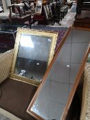 A gilt framed mirror together with a further pine framed mirror