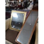 A gilt framed mirror together with a further pine framed mirror