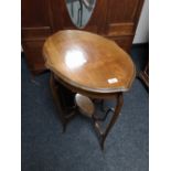 An Edwardian oval occasional table