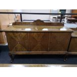 A mid century triple door sideboard