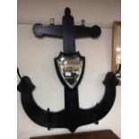 A decorative hall mirror modelled as an anchor