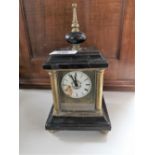 A nineteenth century continental carriage clock on slate and brass