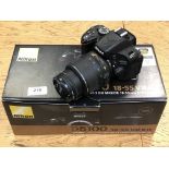 A Nikon D5100 digital camera with DX AF-S Nikkor 18-55mm lens,