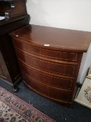 An inlaid mahogany Edwardian four drawer chest