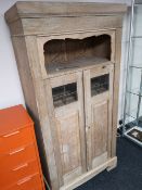 A continental light oak hall cabinet with glazed panel doors CONDITION REPORT: 93cm