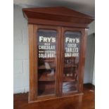A Victorian and later mahogany bookcase - Fry's chocolate